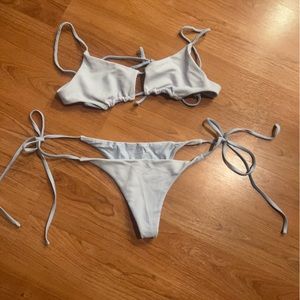 Blue Frankie’s Bikinis thong bikini (medium top and large bottoms)
